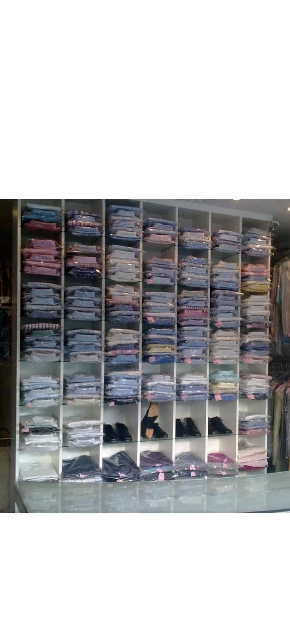 Neatly organised garments at L'Unique