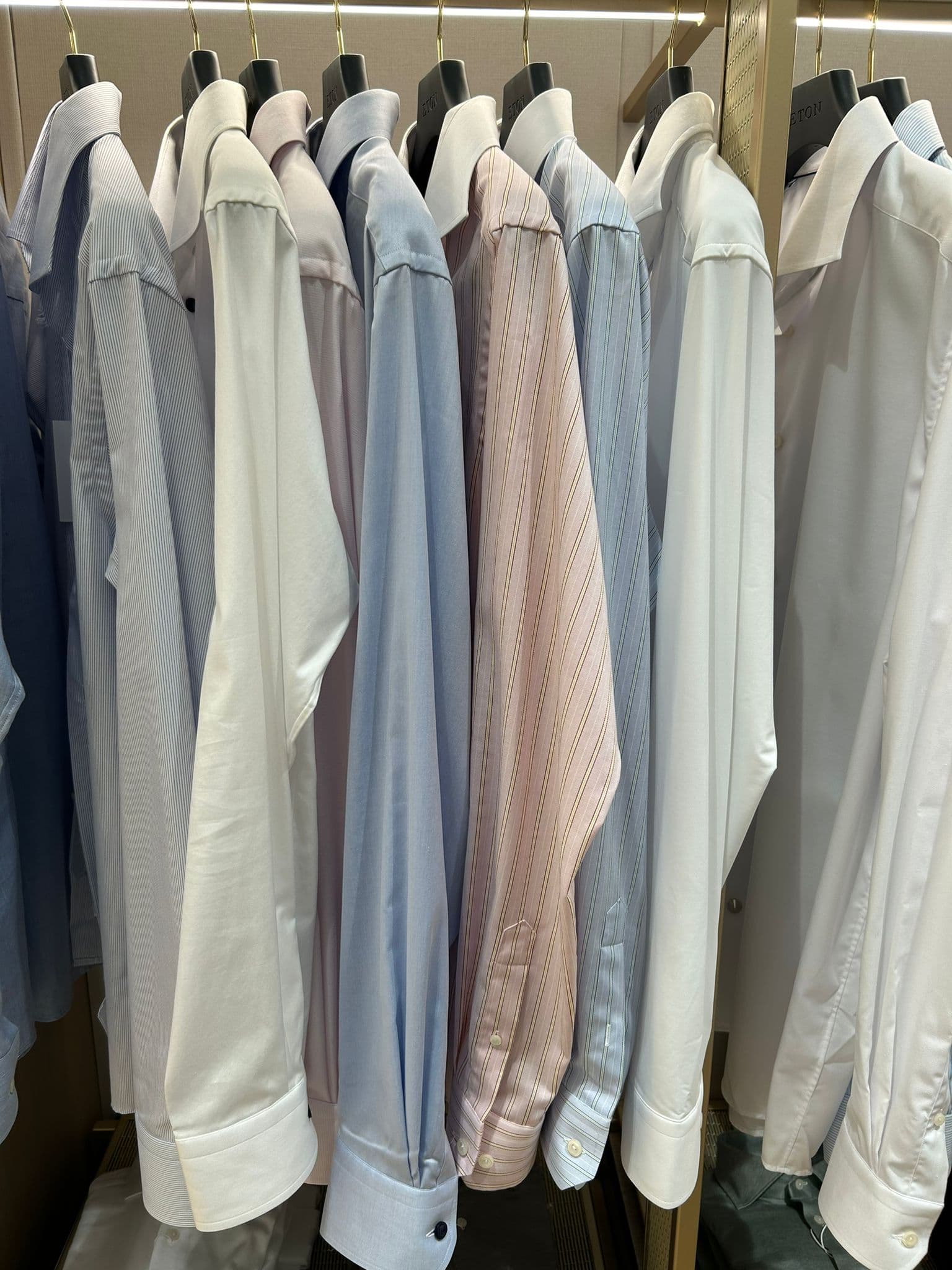 Freshly cleaned and pressed shirts at L'Unique Expert Dry Cleaners, St John's Wood